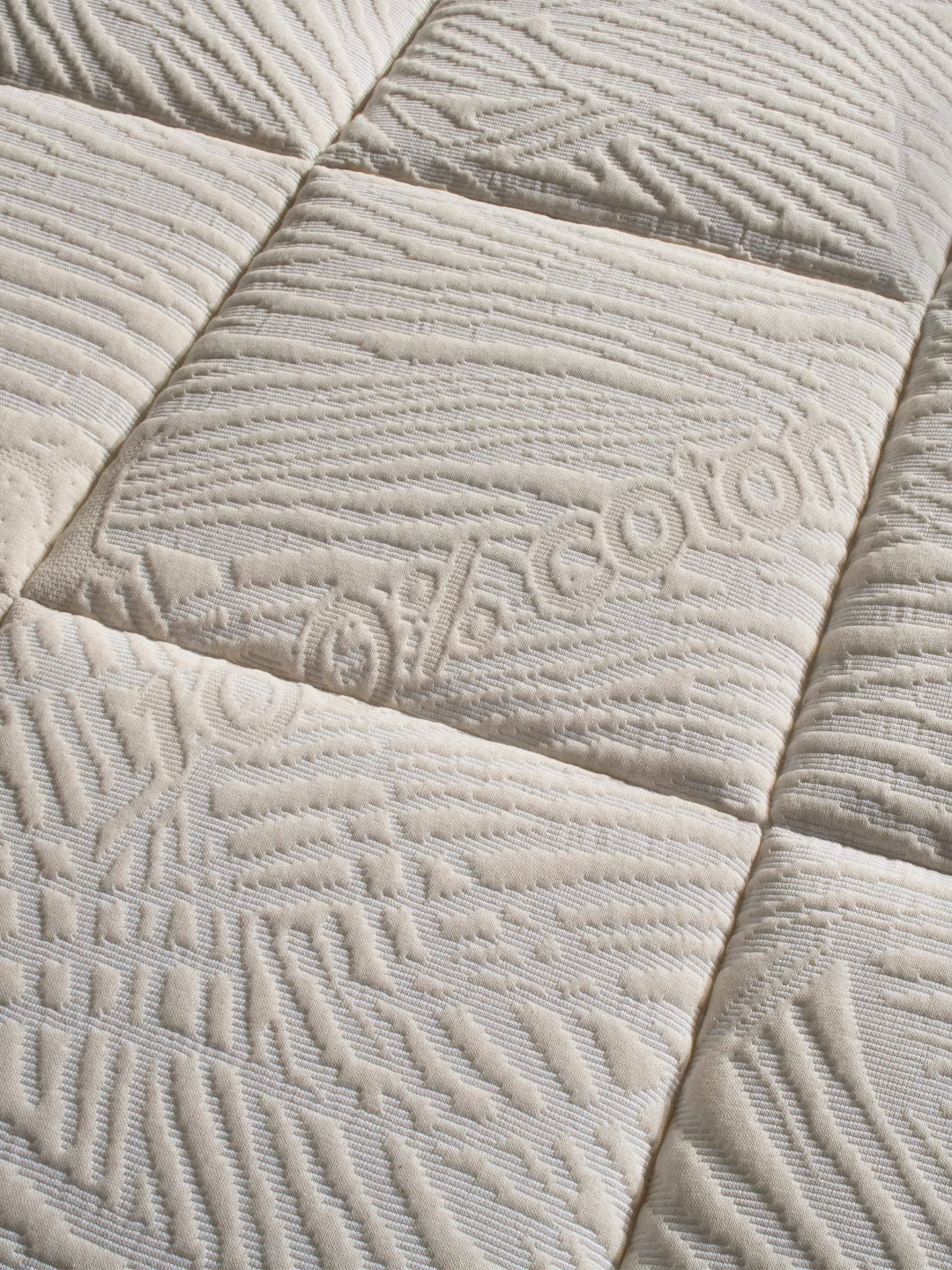 Cotone materasso dettaglio tessuto scritta 100% cotton